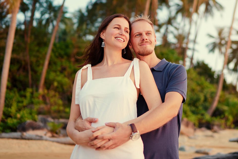 couple hugging at the beach